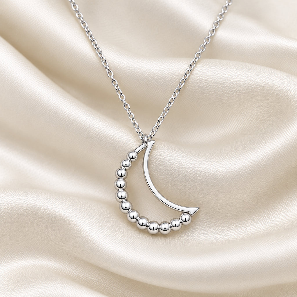 Silver Beaded Crescent Moon Spinner Necklace