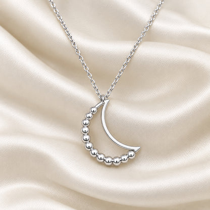 Silver Beaded Crescent Moon Spinner Necklace