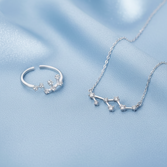 Silver Leo Zodiac Necklace & Ring Bundle on a light gray background