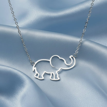Silver Lucky Elephant Necklace on a blue satin background