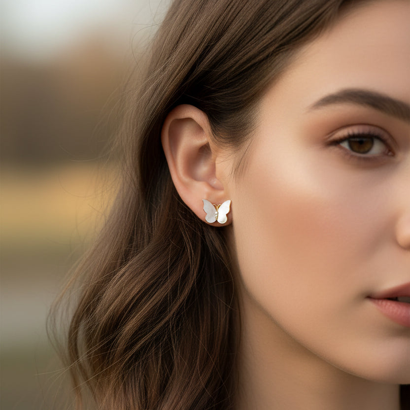 Woman wearing a Mother of Pearl Butterfly Earring