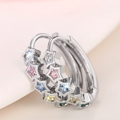 Multicolor Star Hoop Earrings on a light background