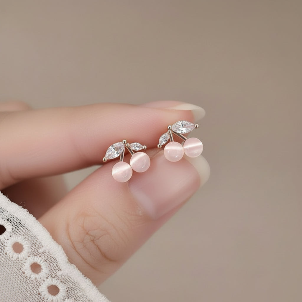 Woman holding Opalescent Cherry Crystal Earrings