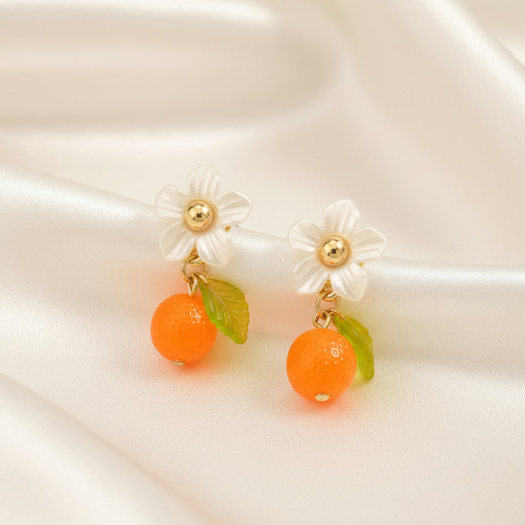 Orange Blossom Dangle Earrings on a light background