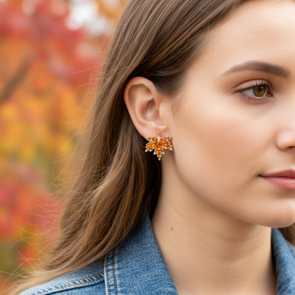 Woman wearing Orange Crystal Maple Leaf Earrings