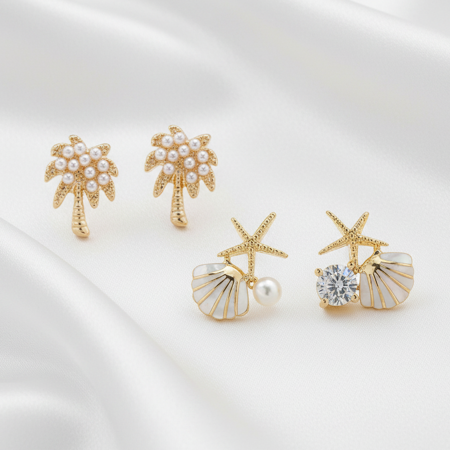 Palm Tree & Pearl Starfish Earring Set on a white background