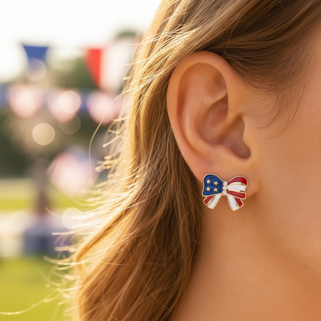 Woman wearing Patriotic Red White & Blue Bow Earrings