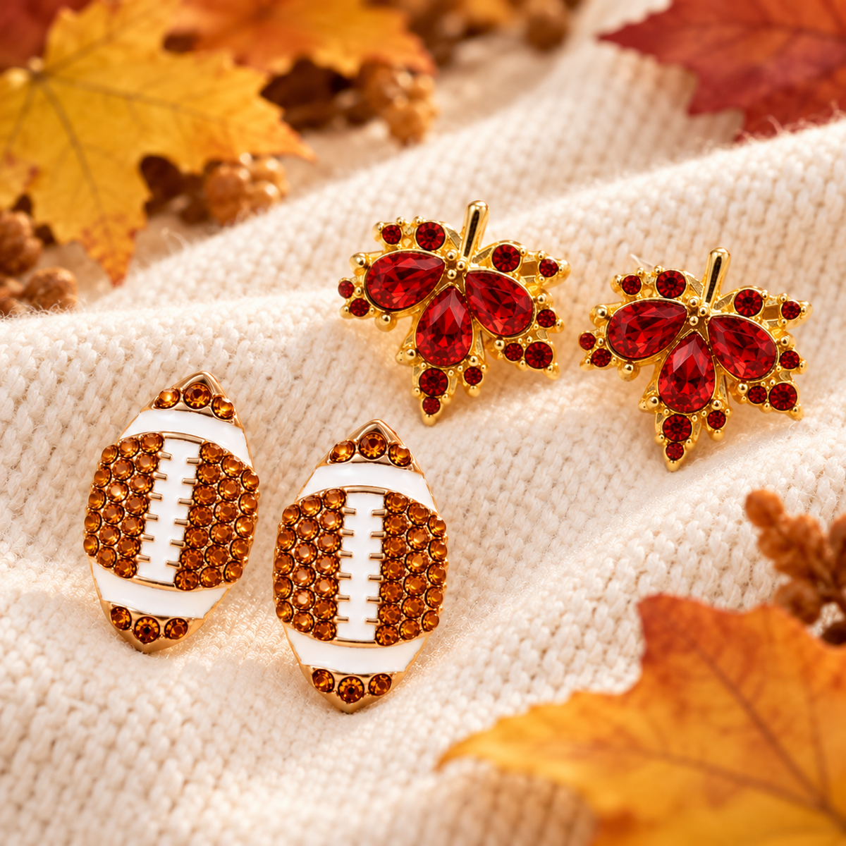 Pavé Football & Maple Leaf Earring Bundle on cream knit