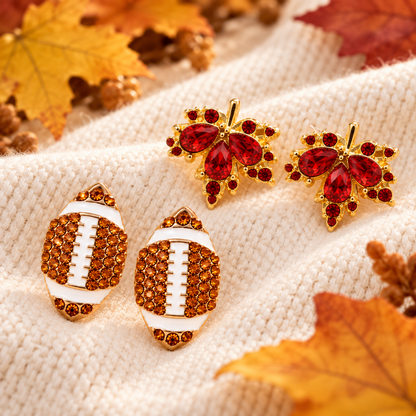 Pavé Football & Maple Leaf Earring Bundle on cream knit