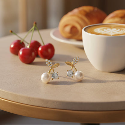 Pearl Cherry Earrings on a morning breakfast table