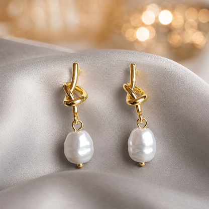 Pearl Knot Drop Earrings on light grey