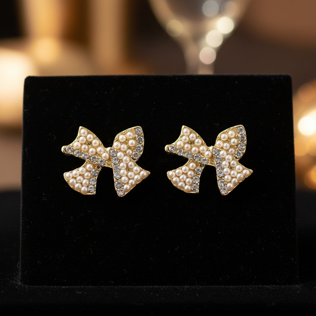 Pearl & Pavé Bow Earrings on black