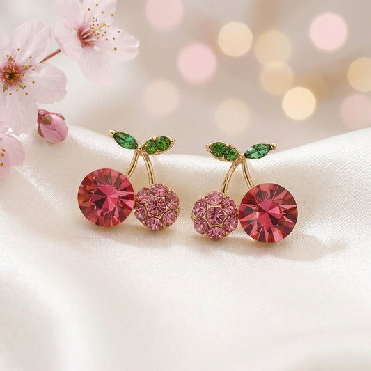 Pink Zircon Cherry Earrings on ceramic