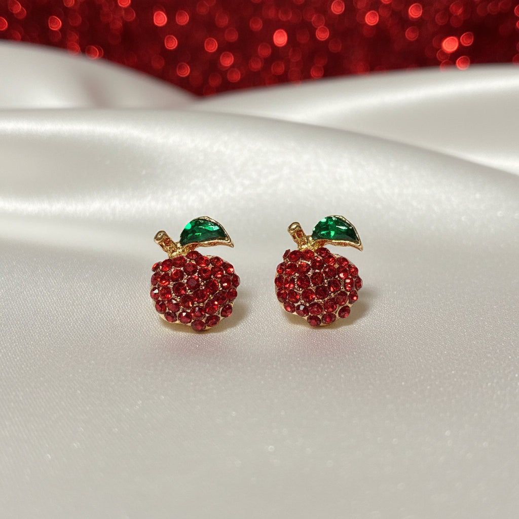 Red Pavé Apple Earrings on white satin