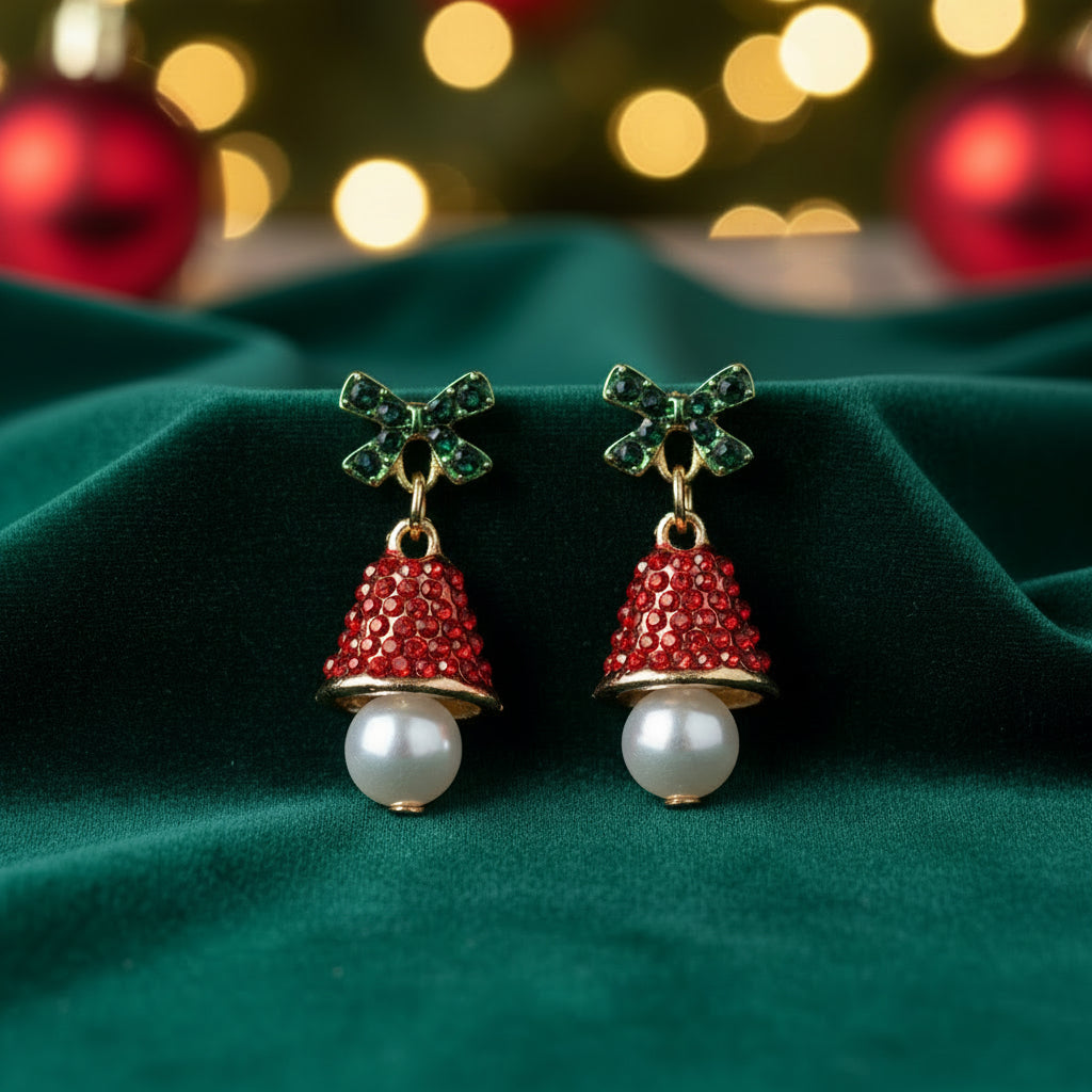 Red Pavé Bell Pearl Drop Earrings on green