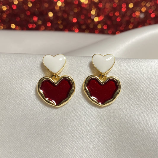 Red & White Double Heart Drop Earrings on a white background