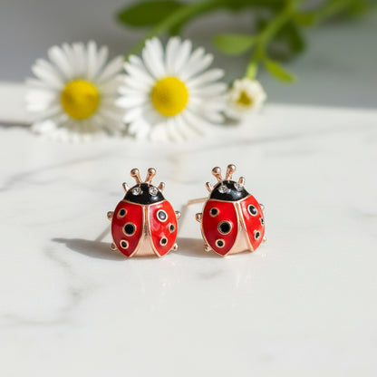 Rose Gold Lucky Ladybug Earrings on marble