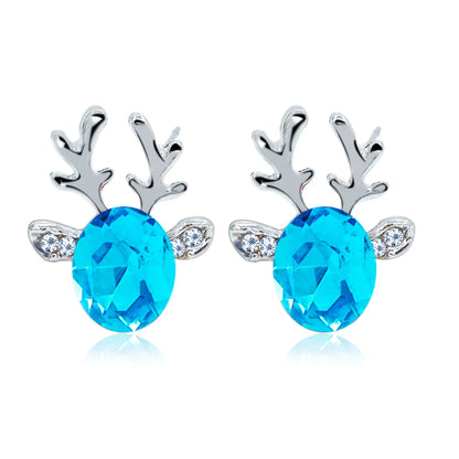 Crystal Blue Reindeer Earrings with blue gemstones and silver antlers on a white background