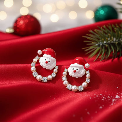Santa Pearl Christmas Wreath Earrings on red satin