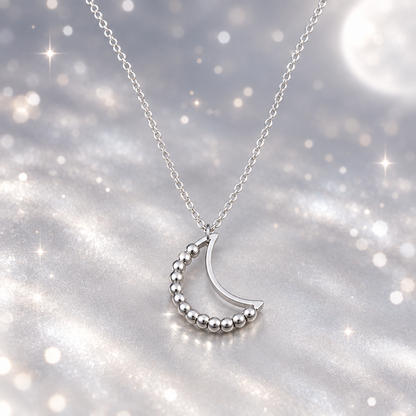 Silver Beaded Crescent Moon Spinner Necklace