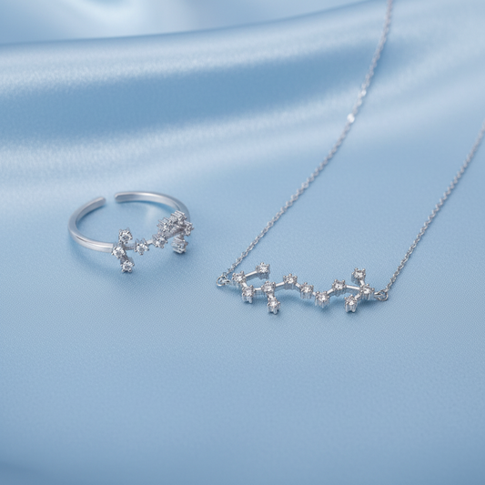 Silver Scorpio Zodiac Necklace & Ring Bundle on a light gray background