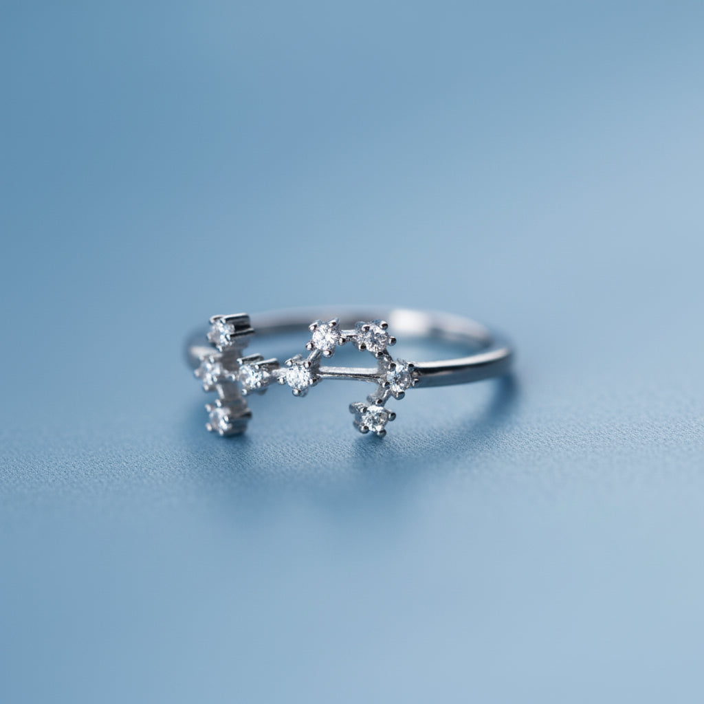 Silver Scorpio Zodiac Ring on a light blue background