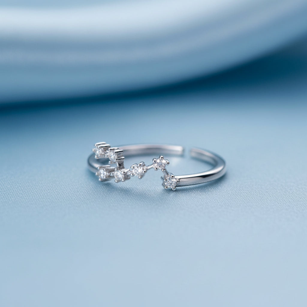 Silver Taurus Zodiac Ring on a light gray background