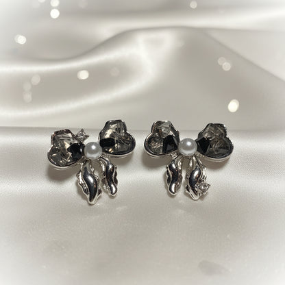 Smoky Crystal Bow Pearl Earrings on white
