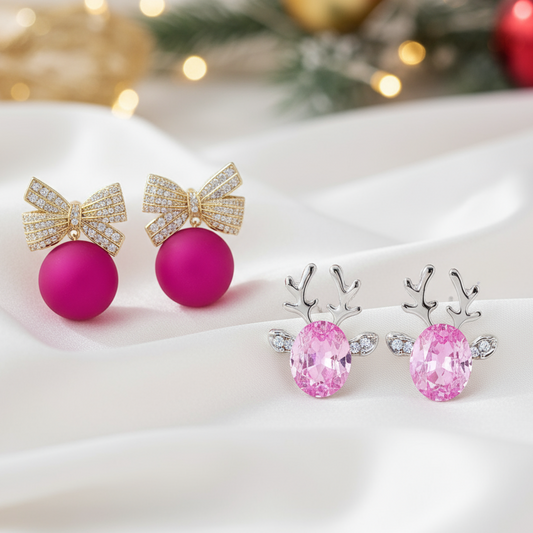 Pink Ornament Bow & Crystal Pink Reindeer Earring Bundle on a white surface with festive background.