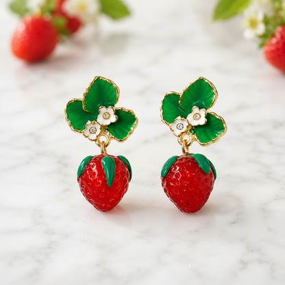 Strawberry Blossom Drop Earrings on a marble surface