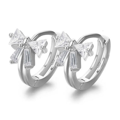 Tiny Crystal Ribbon Earrings with clear gemstones on a white background