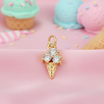 Triple Scoop Ice Cream Cone Charm with diamonds on a pink background with ice cream cones.