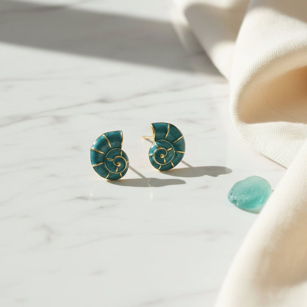 Turquoise Nautilus Shell Earrings with sea glass on marble