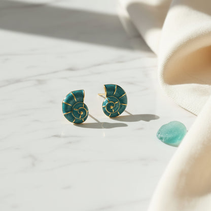 Turquoise Nautilus Shell Earrings with sea glass on marble