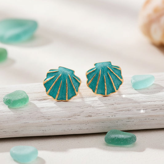 Turquoise Seashell Earrings on driftwood with sea glass