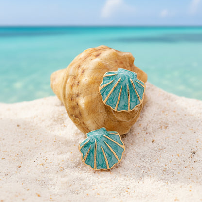 Turquoise Seashell Earrings on a shell and sand