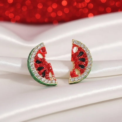 Watermelon Pavé Earrings with rhinestones on a white and red background