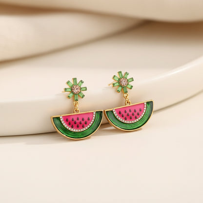 Watermelon Slice Dangle Earrings against a neutral background