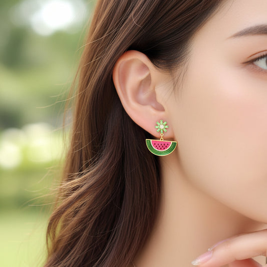 Close-up of a woman wearing a Watermelon Slice Dangle Earring
