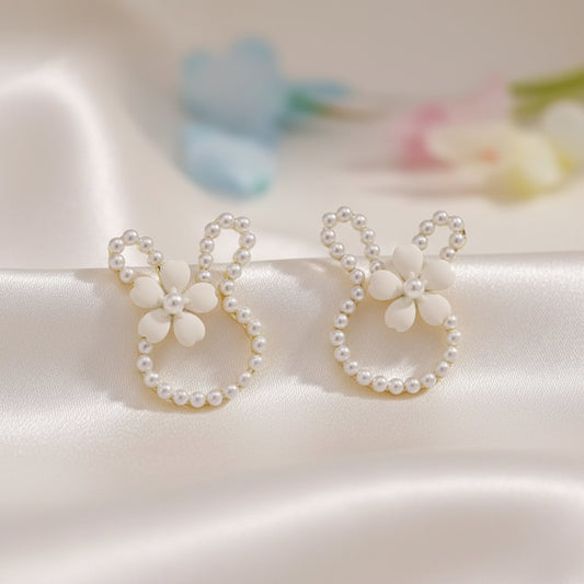 White Pearl Bunny Blossom Earrings on white