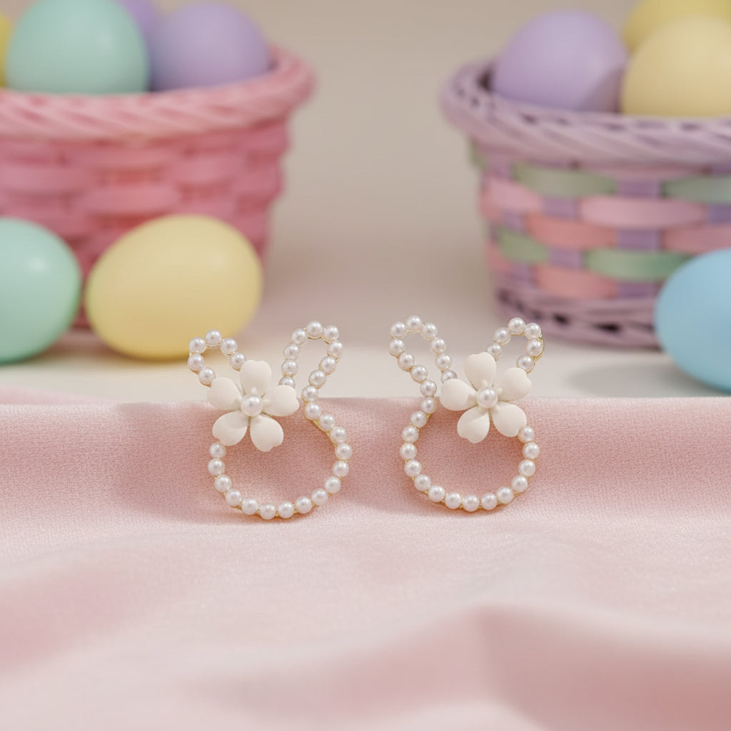 White Pearl Bunny Blossom Earrings on pink
