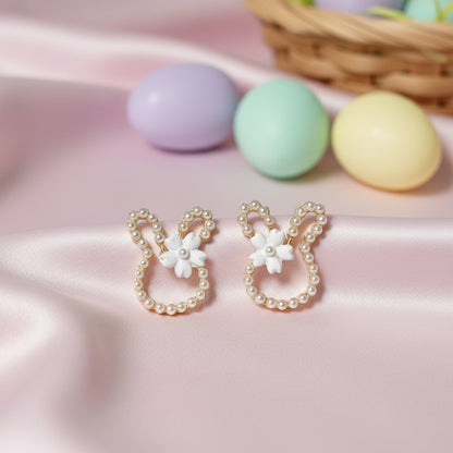 White Pearl Bunny Blossom Earrings on pink