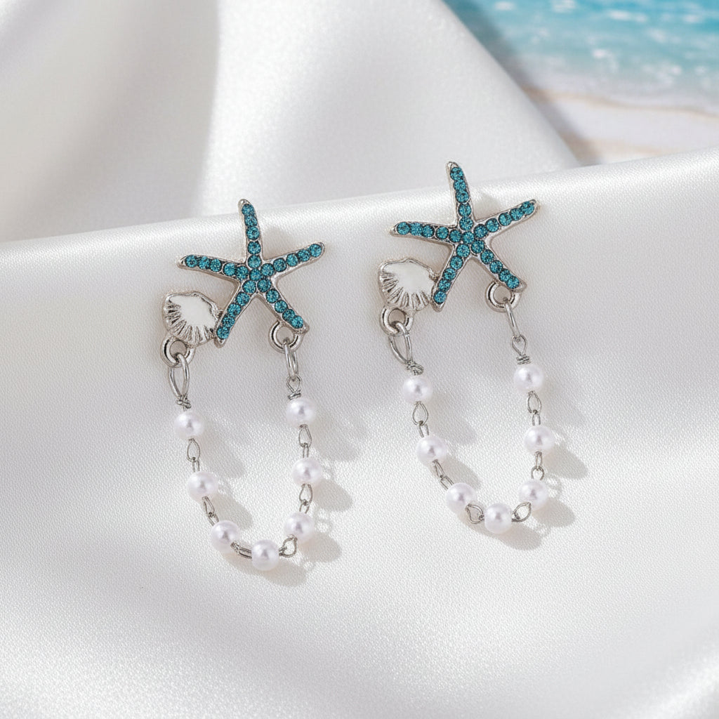 Blue Starfish Shell & Pearl Earrings on white