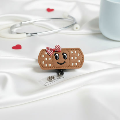 Happy Bandage Badge Reel