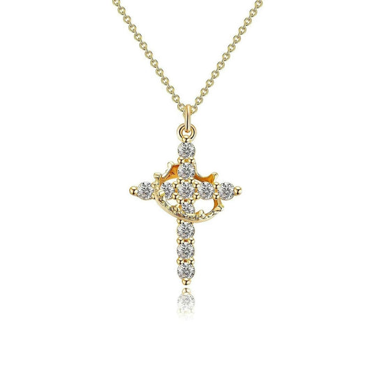 Gold cross pendant necklace with diamonds on a white background