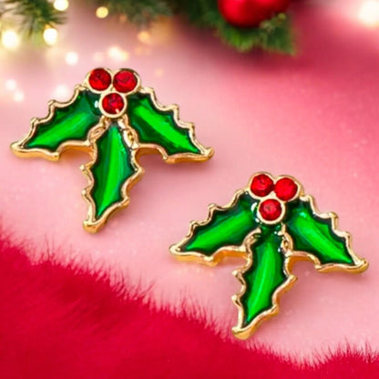 Red Berry Holly Earrings with red centers on a festive background
