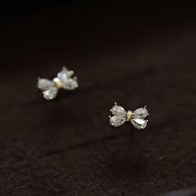 Mini Crystal Bow Earrings in black display