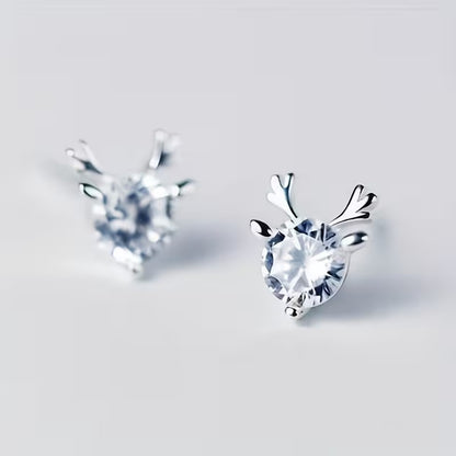 Crystal Silver Reindeer Earrings on a light gray background