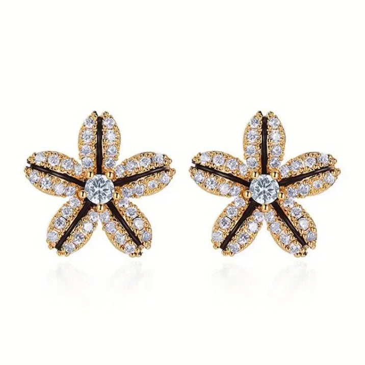 Black & Gold Rhinestone Flower Earrings with gemstones on a white background