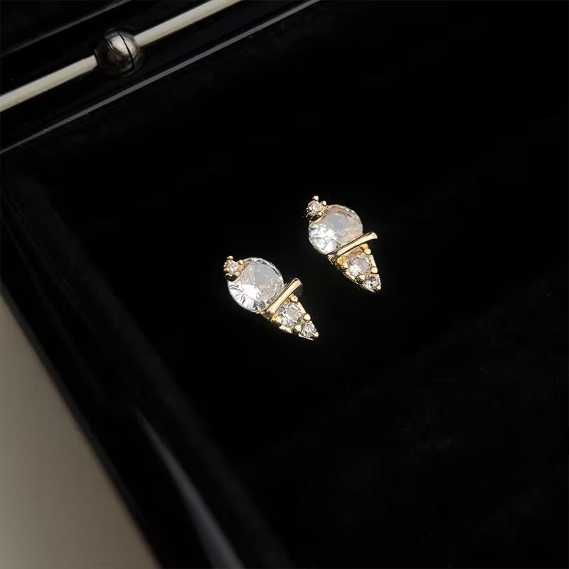 Mini Gold Ice Cream CZ Earrings on a black background